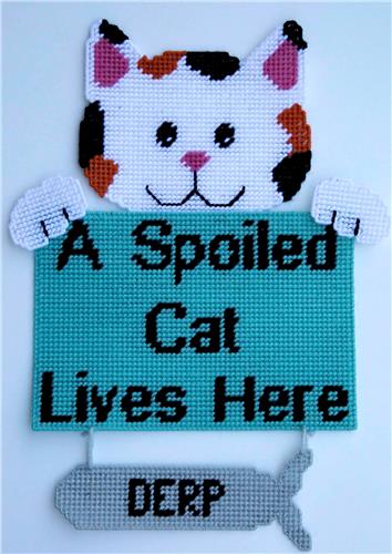 A Spoiled Cat Hanging Sign